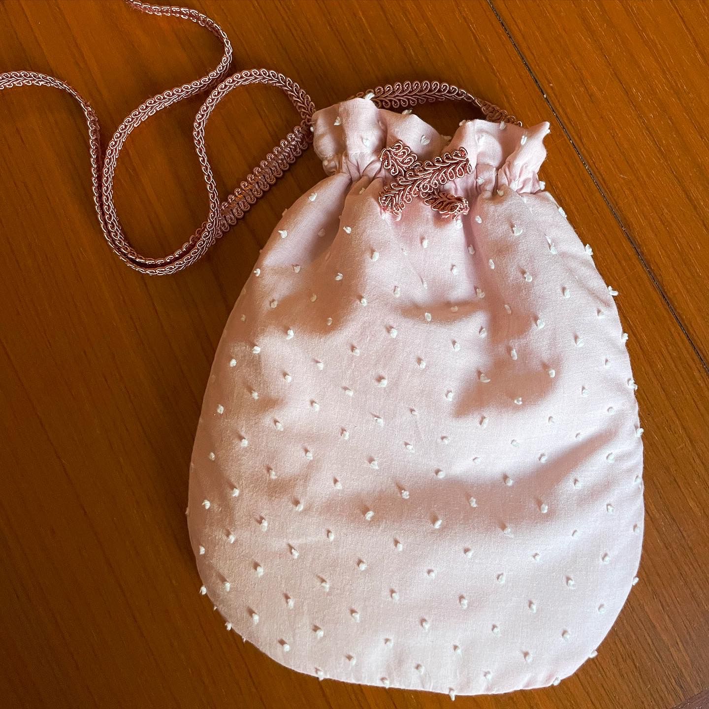 Bourse en plumetis vieux rose