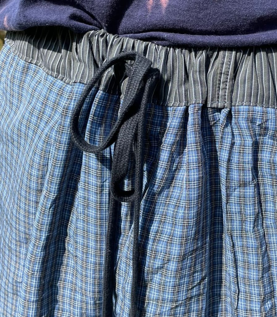 Short homme à carreaux aspect froissé